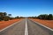 Long, empty road through the Australian outback