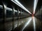 a long empty tunnel with lights on the ceiling