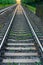 Long endless train railroad vanishing beyond the horizon transport railway track closeup