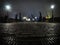 Long exposure of Charles bridge in Prague at night with motion blurred ghosts of people visible