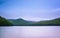 Long exposure of clouds moving over mountains and Long Pine Run