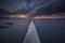 Long exposure clouds moving a pier ruins