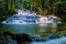 Long exposure exotic beautiful tropical deep rainforest waterfall Fresh turquoise waterfalls in deep forest of Huay Mae Khamin