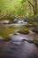 Long exposure gives silky glow on water of the river, Ireland