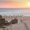 Long exposure of Guincho beach in Cascais, Portugal, a popular kitesurfing spot at sunset