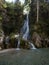 Long exposure of hidden secret spot waterfall in Orrido dello Slizza Gailitz canyon gorge near Tarvisio Italy alps