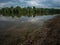 Long exposure at the lake with natural shore