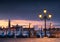 Long exposure of lamp-lit gondolas in the Grand Canal, Venice, I