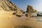 Long exposure at Lolantonis beach in Paros island in Greece with a seashell at the foreground