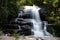 Long exposure of Montha Than waterfall in the jungle of Chiang Mai Thailand