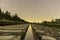 Long exposure night star trails over rail