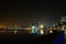 Long exposure night wide angle view of Marginal de Luanda with full moon and Mars during total lunar eclipse