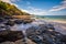 Long exposure, pacific ocean waves on rock in Playa Ocotal, El Coco Costa Rica