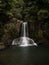 Long exposure panorama of idyllic tropical Kauri tree forest waterfall Waiau Falls near Coromandel Waikato New Zealand