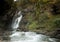 Long exposure photograph of Cascada Del Estrecho  Estrecho waterfall in Ordesa valley, in Autumn season