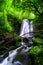 Long Exposure photography. Beautiful waterfall in the rainforest with green nature. MATAI FALLS, The Catlins, New Zealand. I