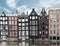 Long exposure picture of traditional Amsterdam old town architecture