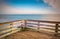 Long exposure a pier and the Chesapeake Bay in Chesapeake Beach, Maryland.