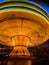 Long exposure of rotating merry go carousel