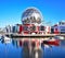 Long exposure of Science world and ships with reflections in the Pacific Ocean, Vancouver BC