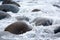 Long exposure of sea and stones on the Utakleiv beach, Lofoten i