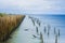 Long exposure seascape bamboo wall to protect the shore from the