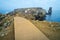 Long exposure seascape and wooden bridge walkway in Carvoeiro cape, Atlantic coast, Portugal