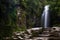 Long exposure shot of beautiful Kaiate waterfall in New Zealand