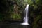 Long exposure shot of beautiful Kaiate waterfall in New Zealand