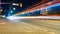 Long exposure shot of the light trails of cars at night on the city road