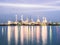 long exposure shot of oil refinery plant against blue evening sk