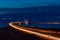Long exposure shot of the Oresund Bridge with traffic light trails at night