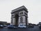 Long exposure street panorama of Arc de Triomphe Etoile monument traffic Champs Elysees Paris France Europe