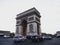 Long exposure street panorama of Arc de Triomphe Etoile monument traffic Champs Elysees Paris France Europe
