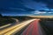 Long-exposure sunset over a highway