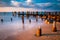 Long exposure at sunset of pier pilings in the Delaware Bay at S