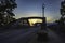 Long exposure of traffic on Bibb Graves Bridge at sunset