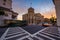 Long exposure of traffic at the Four Corners at sunset, in Charleston, South Carolina