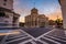 Long exposure of traffic at the Four Corners at sunset, in Charleston, South Carolina