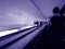 Long exposure of unrecognizable of commuters inside Parisian underground metro