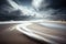 long exposure of windy beach, with waves rolling onto the sand and clouds in the sky