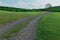 Long Gravel Road That Goes Through Farmland