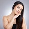 Long hair represents strength, resilience and patience. Studio portrait of an attractive young woman posing against a