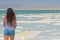 Long-haired brunette walks the islands from salt in dead sea, Israel