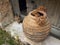 Long Haired Cat and Dried Flower Arrangement in Terracotta Urn, Greece