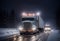 Long Haul Semi-Truck with Cargo Trailer at Night Driving Through Rain and Snow