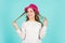 Long and healthy hair. retro girl blue background. happy little kid retro hat. vintage fashion look. summer accessory