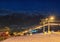 Long illuminated ski slope in Carpathian mountains at night, Zakopane, Poland