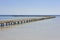 Long jetty over coral reef