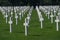 Long lines of white crosses at the Normandy American Cemetery and Memorial, Colleville-sur-Mer, Normandy, France